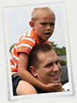 aaron with child on shoulders